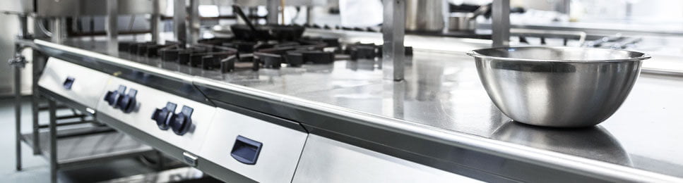 restaurant kitchen working countertop and a metal bowl